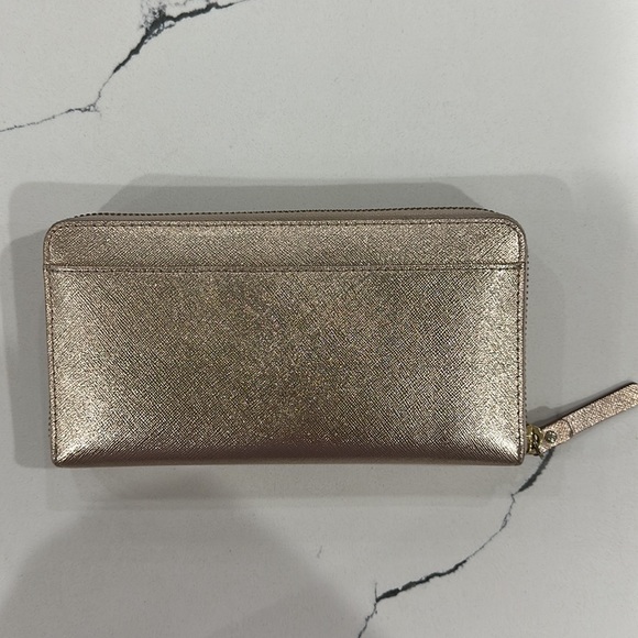 Kate Spade Zip-Around Wallet Metallic Rose Gold - Picture 2 of 5